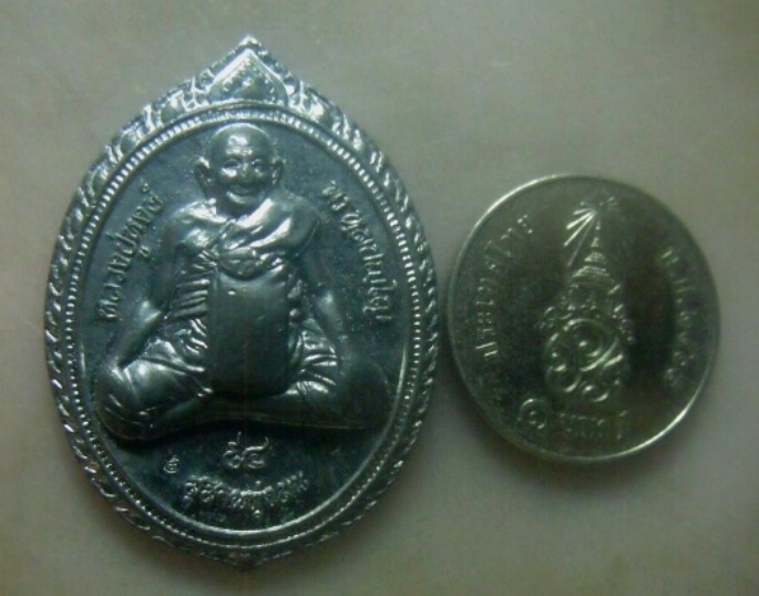 **เบาๆ**เหรียญสาริกานาคพงษ์ ๙๔ หลวงปู่หงษ์ สุสานทุ่งมน จ.สุรินทร์ ปี ๒๕๕๔**ตอกโค้ด สวยๆ