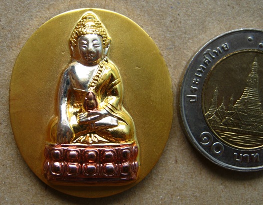 เหรียญพระกริ่งจุลมณีศรีอุบลมหามงคลเจริญโภคทรัพย์ รุ่น1 หลวงปู่คำคนิง วัดถ้ำคูหาสวรรค์ จ อุบลฯ ปี2548