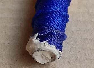 ตะกรุดโทนถักเชือก เมตตา มหานิยม แคล้วคลาด ปลอดภัย  หลวงปู่แผ้ว ปวโร  ปี2550 อุดผงพุทธคุณ ยาว3 นิ้ว