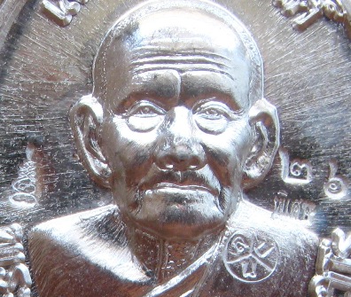 เหรียญเลื่อนฯ หลวงปู่นน สำนักสงฆ์เขาพรานธูป จ.ประจวบฯ ปี2558หมายเลข26 เนื้อเงิน หลังพัดยศ+กล่อง