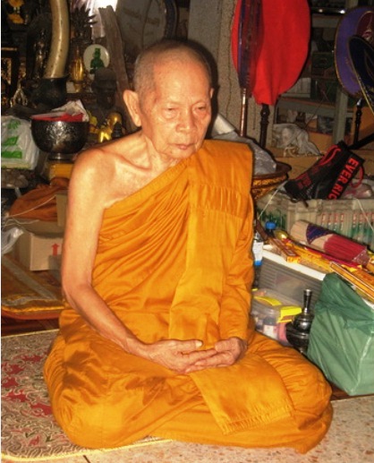 เหรียญปาดตาลรุ่นแรก หลวงปู่ฟู วัดบางสมัคร ฉะเชิงเทรา ปี2556 เนื้อทองฝาบาตร เลข2446 เลี่ยมกันน้ำพร้อม