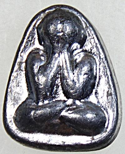 ๒๐ 	พระปิดตา เนื้อตะกั่ว จารหลัง