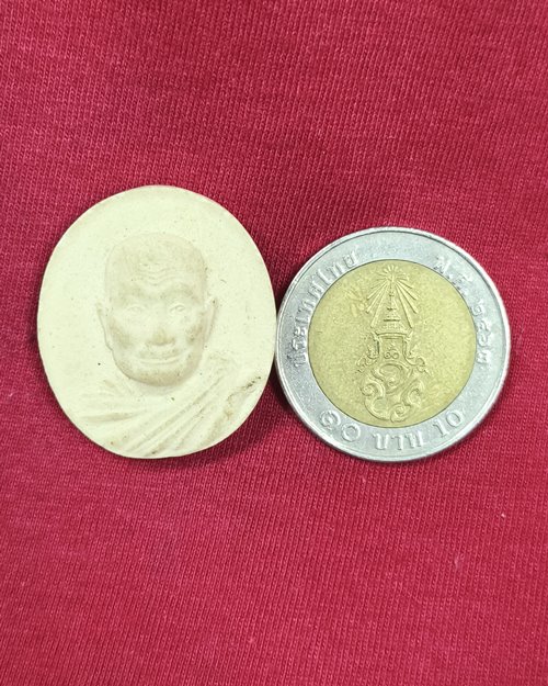 พระผงรูปเหมือน หลวงพ่อจรัญ ฐิตธัมโม วัดอัมพวัน จ.สิงห์บุรี ปี2554