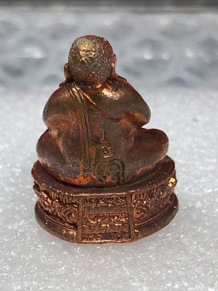 พระปิดตามหาลาภ รุ่นแรก หลวงพ่อจรัญ วัดอัมพวัน ฉลอง อายุวัฒนมงคล 84 ปี ปี 2554 พร้อมกล่องเดิมครับ