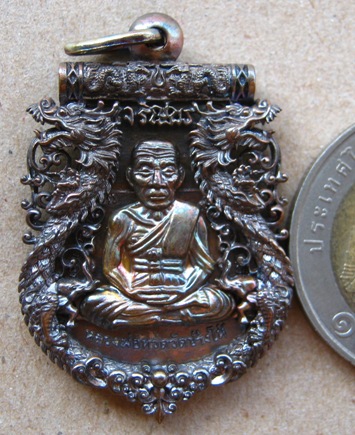 เหรียญฉลุ หลวงพ่อทวด รุ่นเจริญพร เลื่อนสมณศักดิ์ วัดพะโค๊ะ จ สงขลา ปี2555เลข1510 เนื้อนวะ พร้อมกล่อง