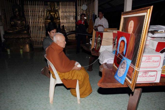 เหรียญหลวงปู่บุญหนา วัดป่าโสตถิผล จ สกลนคร ปี2555 รุ่นมหาลาโภ เนื้อทองแดงรมดำ หมายเลข1275พร้อมกล่องเ