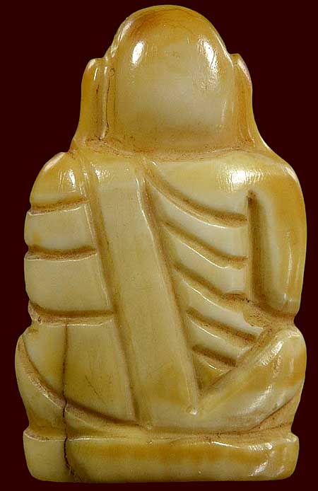 *เขี้ยวหมูตันแกะรูปเหมือนหลวงพ่อเงิน วัดบางคลาน*