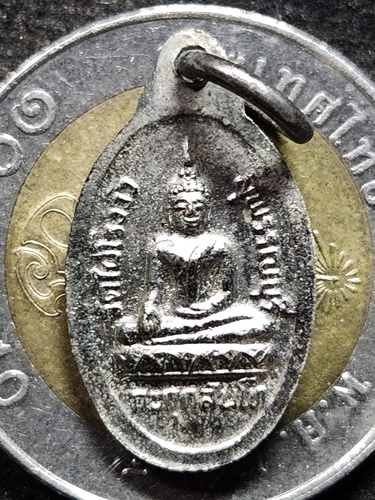 วัดไผ่โรงวัว จ.สุพรรณบุรี เหรียญเม็ดแตง หลวงพ่อขอม  เนื้ออัลปาก้าชุบนิเกิ้ล