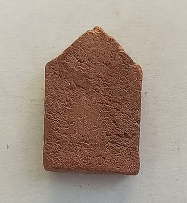 พระเนื้อดินผสมผงหลวงพ่อจรัญ ออกวัดพรหมบุรี ปี 2496