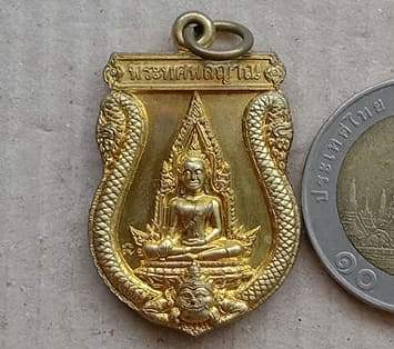 เหรียญพระทศพลญาณ หลังพระพิฆเนศวร์ เจ้าคุณธงชัย วัดไตรมิตรฯ กรุงเทพฯ ปี2549 เนื้อทองฝาบาตร มีโค้ด