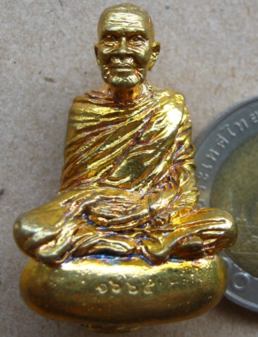 รูปหล่อชินบัญชรเนื้อทองชนวน(ชนวนนวะโลหะเต็มสูตร)หลวงปู่เกลี้ยง วัดโนนแกด ศรีสะเกษ ปี2556เลข1665+กล่อ