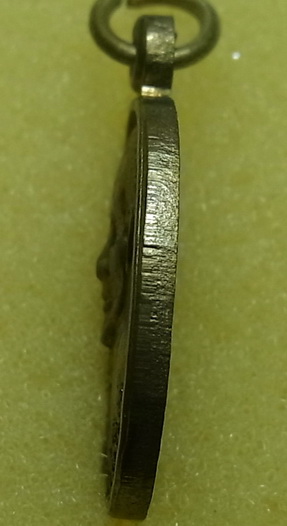 เหรียญหลวงพ่ออุ่นเรือน วัดเจ็ดยอด จ.เชียงราย เนื้อฝาบาตร