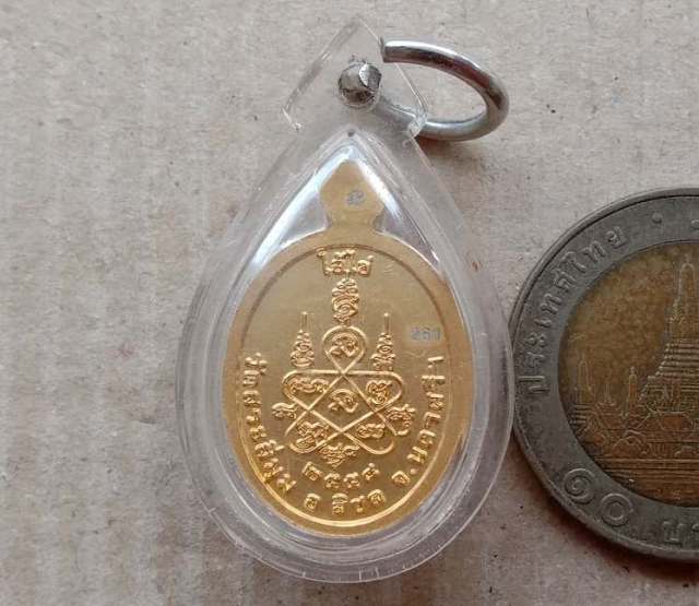เหรียญตาไข่(ไอ้ไข่)เด็กวัดเจดีย์ ออกวัดสระสี่มุม นครศรีธรรมราช ปี58 กะไหล่ทองลงยา เลข261 เลี่ยม+กล่อ