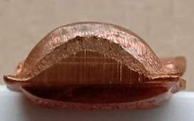 รูปเหมือนปั๊ม หลวงพ่อคูณ รุ่นปาฏิหาริย์ EOD ปี2556 ไม่ตัดปีก พิมพ์ใบเสมา เนื้อทองแดงผิวไฟ หมายเลข662