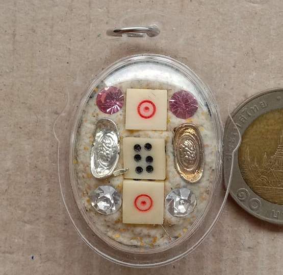 ล็อกเก็ตเจ้าพ่อยี่กอฮงรูปไข่หลังไฉ่ซิ่งเอี้ย หลวงปู่คีย์ วัดศรีลำยอง สุรินทร์ ปี2553" รุ่นเศรษฐี รวย