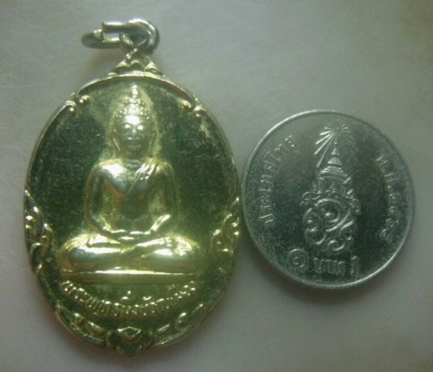 **เบาๆ**เหรียญพระพุทธมิ่งขวัญเมือง วัดใหม่บ้านเหล่า ต.นาจักร์ จ.แพร่ ปี ๒๕๓๕**กะไหล่ทอง สวยๆ