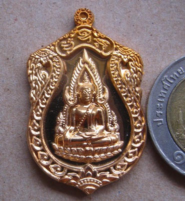 เหรียญเสมา พระพุทธชินราช รุ่นจอมราชันย์ เนื้อทองทิพย์ ปี2555 หมายเลข9457 พร้อมกล่องเดิม