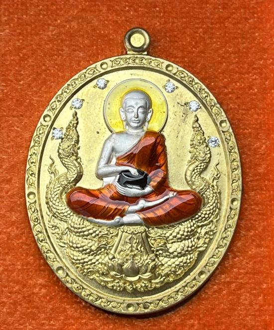 เหรียญพระสิวลี รุ่นอุดมทรัพย์ หลัง พญามุจลินท์นาคราช วัดร่องคำหลวงอ.เมืองพเยา จ.พะเยา ฝังพลอย หน้ากา