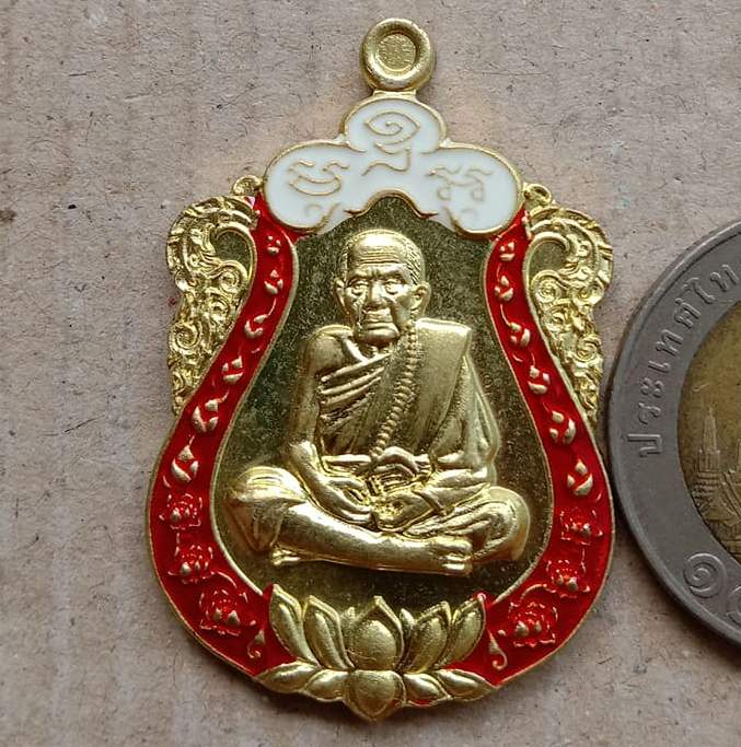 เหรียญหลวงปู่หมุน รุ่นปาฏิหารย์ทรัพย์เศรษฐี วัดบ้านจาน ศรีสะเกษ ทองฝาบาตรลงยาขอบแดงบนขาว เลข893+กล่อ