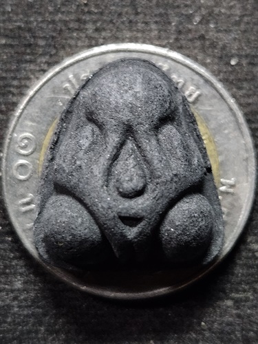 วัดกำแพง จ.ชลบุรี พระปิดตามหาอุตม์ หลวงปู่เหมือน  หลังยันต์อุ ปี2522 เนื้อผงดำ 