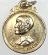 เหรียญ หันข้างกลมเล็ก เจ้าคุณนรฯ แจกกรรมการ วัดเทพศิรินทราวาส กทม. หลังยันต์น้ำเต้า ปี 13