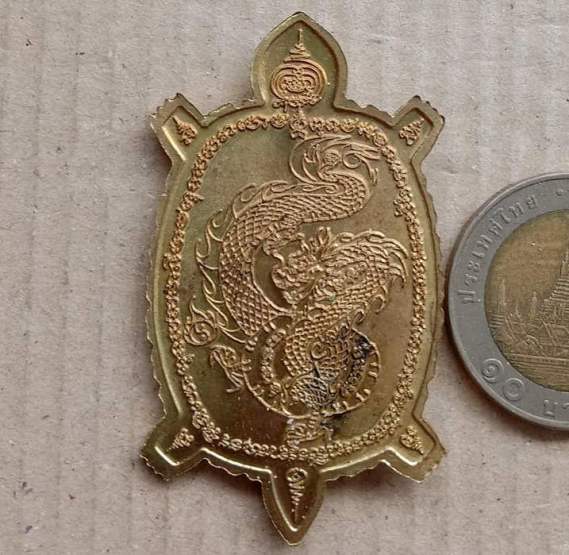 เหรียญพญาเต่าเรือน หลวงปู่บุญทา วัดป่าสุนันทาราช ร้อยเอ็ด ปี2556 เนื้อทองเหลือง มีโค้ด เลข82+กล่อง