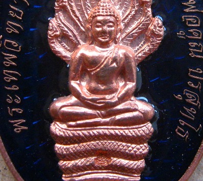 เหรียญนาคปรกรุ่นแรก หลวงพ่อคูณ รุ่นสร้างกุฏิสงฆ์(วัดปรก)ปี2554 เนื้อทองแดงลงยา หมายเลข39 พร้อมกล่อง