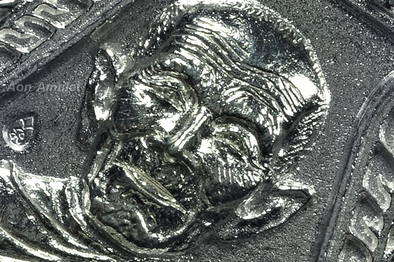 เหรียญหล่อหน้าเสือเนื้อเงิน รุ่น เงินไหลมา หลวงปู่แสน ปสนฺโน พ.ศ.2561 หมายเลข 36