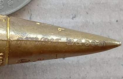 เขี้ยวเสือพุทธาคม เนื้อทองทิพย์ หลวงพ่อหวล วัดชาวเหนือ จ ราชบุรี ปี2558 กรรมการ หมายเลข25613