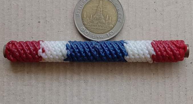 ตะกรุดโสฬสมงคลจารมือแบบโบราณ ถักลายธงชาติ ลงน้ำมันว่านมงคล รุ่นทองแดง พระอาจารย์แว่น วัดสพานสูง