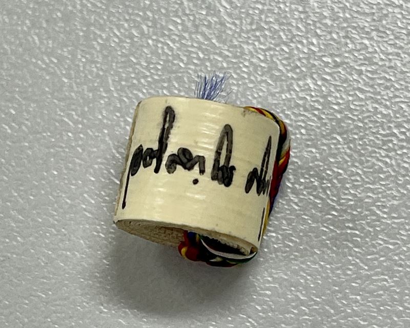 ตะกรุดลูกอมโลกธาตุ พระมหาสุรศักดิ์ วัดประดู่ฯ สมุทรสงคราม เนื้อใบลาน ผูกไหม พร้อมจารลายเซ็นต์