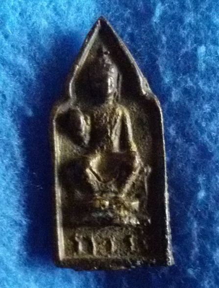 เหรียญหล่อพระพุทธรูปศิลาขาว วัดพระปฐมเจดีย์ พ.ศ. 2487