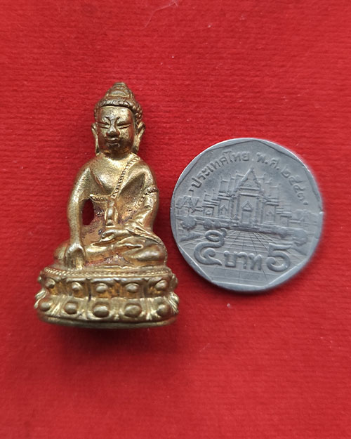 พระกริ่งพุทธจักรเพชร อาจารย์ติ๊ก วัดดาวดึงษ์ เนื้อทองผสม