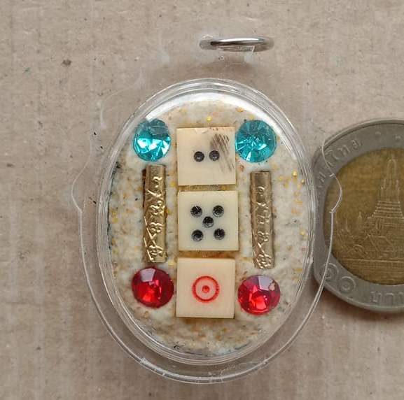 ล็อกเก็ตเจ้าพ่อยี่กอฮงรูปไข่หลังไฉ่ซิ่งเอี้ย หลวงปู่คีย์ วัดศรีลำยอง สุรินทร์ ปี2553" รุ่นเศรษฐี รวย