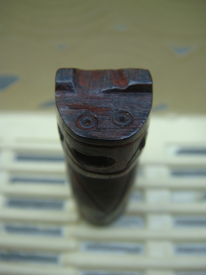 เสือแกะ ไม้แดง คาบตะกรุดอุดกริ่ง จารก้น พ่อครูธนศักดิ์