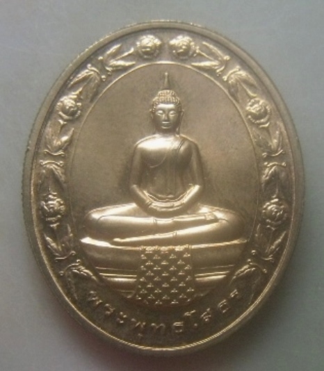 **เบาๆ**เหรียญหลวงพ่อโสธร รูปไข่ลายดอกไม้ เนื้อทองเเดงนอกขัดเงา ปี ๒๕๔๒**ขอบสตางค์ มีโค้ด สวยๆ