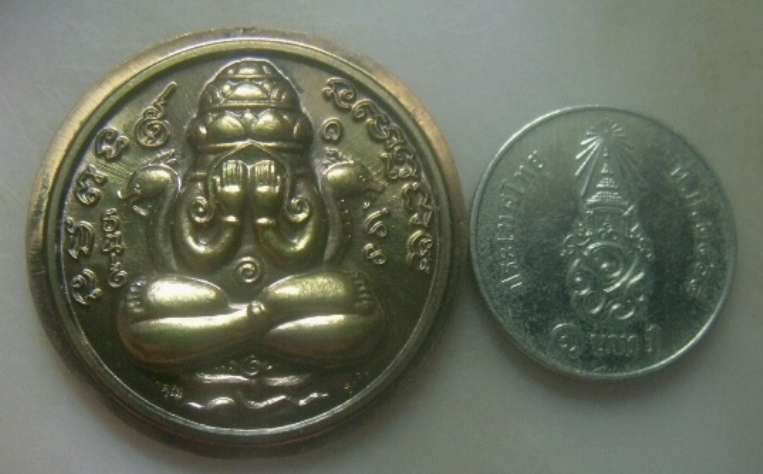 **เบาๆ**เหรียญปิดตาพังพระกาฬ รุ่นธงชัย พระพรหมมังคลาจารยเจ้าคุณธงชัยวัดไตรมิตรฯ ปี ๒๕๕๙**ตอกโค้ด สวย