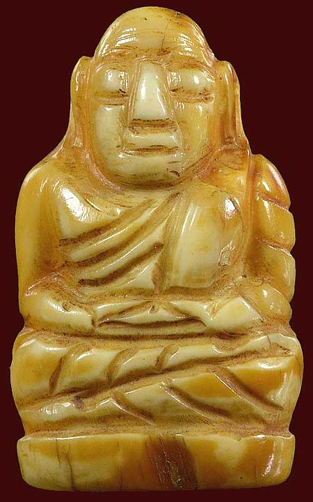 *เขี้ยวหมูตันแกะรูปเหมือนหลวงพ่อเงิน วัดบางคลาน*