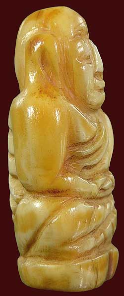 *เขี้ยวหมูตันแกะรูปเหมือนหลวงพ่อเงิน วัดบางคลาน*