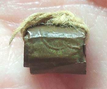 *ตะกรุดม้วนลูกอมโลกธาตุ หลวงพ่อเปลี่ยน วัดใต้ กาญจนบุรี*