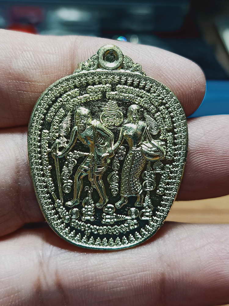 4-88 เหรียญชูชกจูงนาง รุ่นเศรษฐีโภคทรัพย์ หลวงพ่อสัญญา(คง) วัดกลางบางแก้ว อ.นครชัยศรี จ.นครปฐม 2556