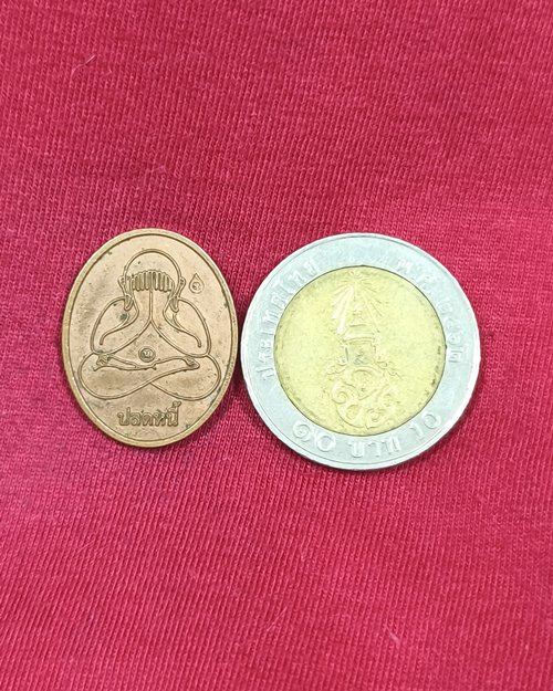 เหรียญพระปิดตาปลดหนี้ วัดบ่อทองราษฎร์บำรุง จ.ชลบุรี เนื้อทองแดงผิวไฟ ตอกโค๊ต ปี2556