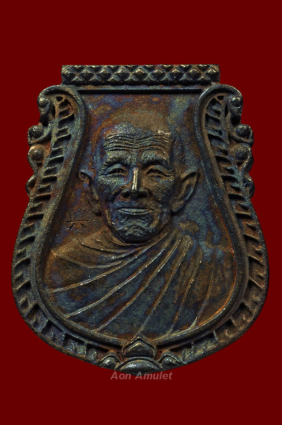 เหรียญหล่อหน้าเสือเนื้อแร่กายสิทธิ์เก้ามงคล รุ่น เงินไหลมา หลวงปู่แสน ปสนฺโน พ.ศ.2561 หมายเลข 52