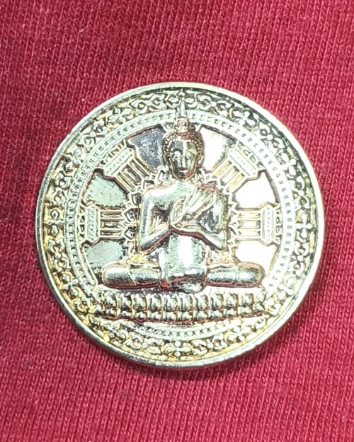 เหรียญกลมธรรมจักร ปางปฐมเทศนา หลังยันต์ กะไหล่เงิน (ไม่ทราบที่)