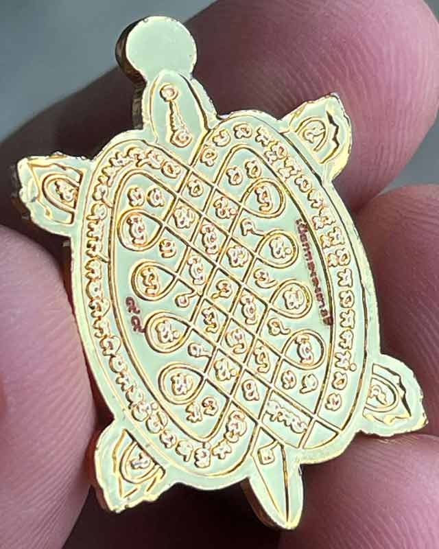 เหรียญพญาเต่าเรือน รุ่นแสนรวยไม่หยุด หลวงปู่แสน ปสนโน   วัดบ้านหนองจิก อ.ขุนหาญ จ.ศรีสะเกษ เลข 99 