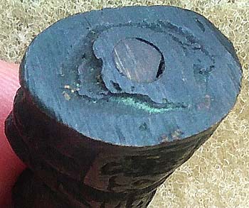 *กริ่งอุปคุตถือดอกบัว หลังยันต์พุทโธ*