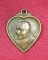 เหรียญรูปหัวใจ หลวงพ่ออุตตมะ วัดวังก์วิเวการาม จ.กาญจนบุรี อายุ94ปี 2547