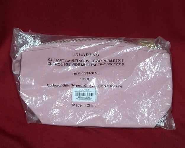 (ปิด39-)กระเป๋าซิปสตรี CLARINS ขนาด14x24ซ.ม. (สภาพไม่ได้ใช้)