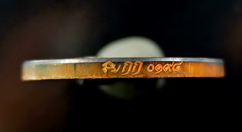 เหรียญพระโพธิสัตว์จตุคามรามเทพ รุ่นขุมทรัพย์สี่แผ่นดิน เนื้อนวะโลหะแก่เงิน ขนาด 3.2 ซม. สวยครับ