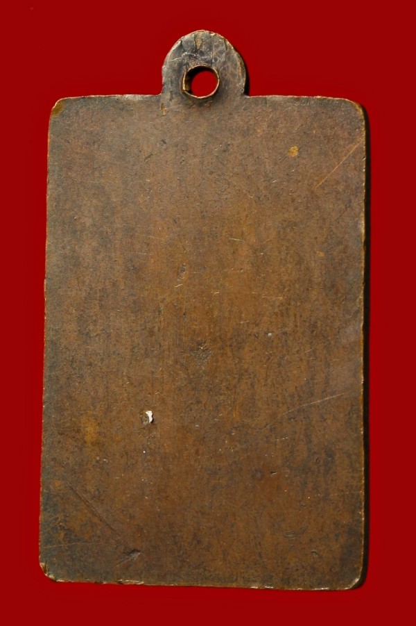 เหรียญพระพุทธนั่งอุ้มบาตร พระหัตถ์ถือดอกบัว